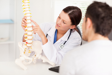 our chiropractor explains what spinal decompression is to a patient